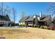 Expansive backyard featuring a refreshing in-ground pool, patio area, and lush lawn perfect for entertaining at 109 Lighthorse Blvd, Mcdonough, GA 30252