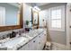 Bright bathroom featuring granite countertops, double sinks, and modern fixtures, offering a clean and stylish space at 109 Lighthorse Blvd, Mcdonough, GA 30252