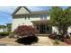 Inviting exterior with mature landscaping and a covered front porch at 109 Lighthorse Blvd, Mcdonough, GA 30252