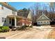 Charming home featuring a well-manicured front yard, a two-car garage, and a welcoming front porch at 109 Lighthorse Blvd, Mcdonough, GA 30252
