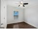 Bright bedroom features hardwood floors, a modern ceiling fan, and neutral paint at 3378 La Vista, Hapeville, GA 30354