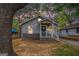 Cozy one-story home with a charming front porch, surrounded by mature trees at 3378 La Vista, Hapeville, GA 30354