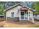 Charming single-story home with a welcoming front porch and attractive curb appeal at 3378 La Vista, Hapeville, GA 30354