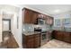 Charming kitchen with stainless steel appliances, granite counters, and decorative backsplash at 3378 La Vista, Hapeville, GA 30354