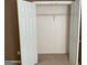 Empty closet interior with wire shelving and bi-fold doors at 1028 Field View Dr, Mcdonough, GA 30253