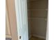 A walk-in closet, showcasing the interior, wire shelving, with a view of the open door at 1028 Field View Dr, Mcdonough, GA 30253