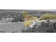 Aerial view of land with a home close to a roundabout with surrounding trees at 315 S Bethany Rd, Mcdonough, GA 30252