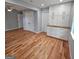 A bedroom features hardwood floors, built-in cabinets and drawers, and a double door closet at 487 Eastside Dr, Dacula, GA 30019