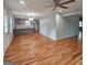 Modern kitchen seamlessly connected to the living area, featuring gray cabinetry at 487 Eastside Dr, Dacula, GA 30019