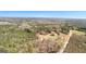 Expansive aerial view of the property showcasing its vast wooded acreage at 461 Old Jackson Rd, Mcdonough, GA 30252
