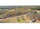 Aerial view showing property layout, road access, and surrounding trees at 461 Old Jackson Rd, Mcdonough, GA 30252