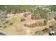 Aerial view showcasing the acreage and proximity to the road and surrounding landscape at 461 Old Jackson Rd, Mcdonough, GA 30252