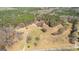 Aerial view highlights the estate's layout, expansive fields, and road access at 461 Old Jackson Rd, Mcdonough, GA 30252