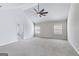A bright and spacious primary bedroom features vaulted ceilings, carpet, and natural light at 365 Othello Dr, Hampton, GA 30228