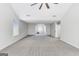 Large bonus room featuring vaulted ceilings, carpet, natural light, and a neutral color palette at 365 Othello Dr, Hampton, GA 30228
