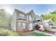 Two-story brick home with a manicured lawn and a two-car garage at 365 Othello Dr, Hampton, GA 30228