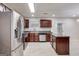 Modern kitchen features stainless steel appliances, dark cabinets, and a kitchen island at 365 Othello Dr, Hampton, GA 30228