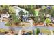 Aerial shot of upscale home with lush landscaping, circular driveway, and a tranquil lake nearby at 216 Southwick Ln, Peachtree City, GA 30269