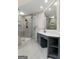 The bathroom includes a glass enclosed shower and vanity with modern fixtures at 216 Southwick Ln, Peachtree City, GA 30269