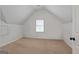 Bedroom with neutral carpet and trim featuring one window and one closet at 216 Southwick Ln, Peachtree City, GA 30269