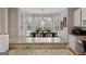 Charming breakfast nook with large windows that offer scenic backyard views at 216 Southwick Ln, Peachtree City, GA 30269