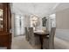 Formal dining area with elegant chandelier, and large windows at 216 Southwick Ln, Peachtree City, GA 30269