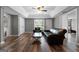 Open living room featuring recessed lighting, hardwood floors, and lots of seating space at 216 Southwick Ln, Peachtree City, GA 30269