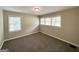 Bedroom featuring neutral walls, carpeted floor, and plenty of natural light at 1994 Marvin Sw Ln, Atlanta, GA 30311