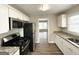 Updated kitchen featuring granite countertops and stainless steel appliances at 1994 Marvin Sw Ln, Atlanta, GA 30311