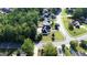 Aerial view of a residential street with lush greenery at 200 Kensington Trce, Stockbridge, GA 30281