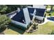Aerial view showing home's roof and well-manicured backyard landscaping at 200 Kensington Trce, Stockbridge, GA 30281