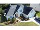 Aerial view showing home's roof and well-manicured front yard landscaping at 200 Kensington Trce, Stockbridge, GA 30281