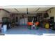 Finished garage including dining area, appliances, and storage at 200 Kensington Trce, Stockbridge, GA 30281