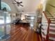 Spacious living room with hardwood floors, tall ceilings, and lots of natural light at 200 Kensington Trce, Stockbridge, GA 30281
