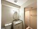 This bathroom offers a modern tile shower, granite vanity, and updated lighting at 2099 Yucca Dr, Decatur, GA 30032