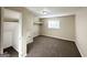 Bedroom offers neutral walls, soft carpeting, closet, natural light and ample space at 2099 Yucca Dr, Decatur, GA 30032