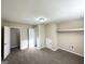 Spacious bedroom featuring neutral walls, soft carpeting, closet, and ample space at 2099 Yucca Dr, Decatur, GA 30032