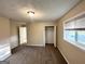Bedroom featuring neutral walls, carpeted flooring, closet, and natural light at 2099 Yucca Dr, Decatur, GA 30032