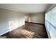 Inviting living room features hardwood floors, neutral paint, and window allowing natural light to fill the space at 2099 Yucca Dr, Decatur, GA 30032