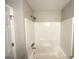 Bathroom shower featuring sleek chrome fixtures and clean lines, providing a stylish and functional space at 2578 Lavender Ct, Decatur, GA 30034