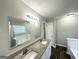Bathroom with double vanity, granite countertops and a bathtub at 2578 Lavender Ct, Decatur, GA 30034