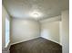 A cozy bedroom featuring neutral paint, carpeted flooring, and bright windows for comfortable living at 2578 Lavender Ct, Decatur, GA 30034