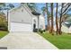 Charming two-story home with a well-manicured lawn, two car garage, and inviting curb appeal at 2578 Lavender Ct, Decatur, GA 30034