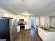 Modern kitchen featuring granite countertops, stainless steel appliances, and ample cabinet space at 2578 Lavender Ct, Decatur, GA 30034