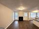 Open living room with fireplace, hardwood floors, and natural light at 2578 Lavender Ct, Decatur, GA 30034