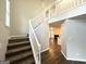 Carpeted staircase leading to the second floor with the view of the living room at 2578 Lavender Ct, Decatur, GA 30034