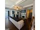 Spacious living room featuring a fireplace, coffered ceilings, and dark hardwood floors at 3168 Spicy Cedar Ln, Lithonia, GA 30038