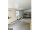 Spacious garage with room for storage, paint supplies, brooms, and building materials for an extra project at 7665 Antebellum Ln, Riverdale, GA 30274