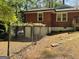 Backyard featuring a partial fence and access to possible basement at 1815 Dodson Sw Dr, Atlanta, GA 30311