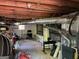 Unfinished basement with exposed pipes and essential utilities at 1815 Dodson Sw Dr, Atlanta, GA 30311